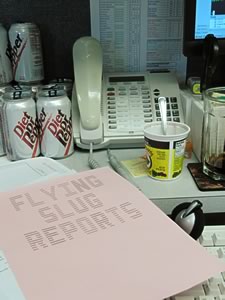The Flying Slug Reports - on my messy desk