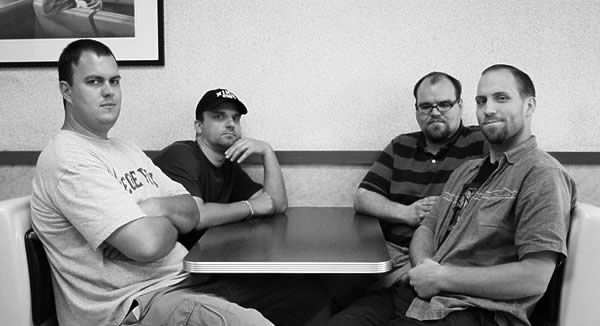 Jim Guys sitting in traditional booth in Bend McDonalds