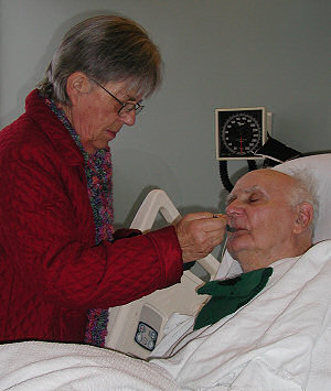 feeding Grandpa soup